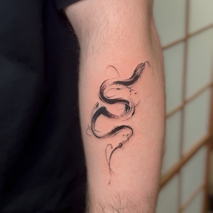 Tatouage réalisé par Joda